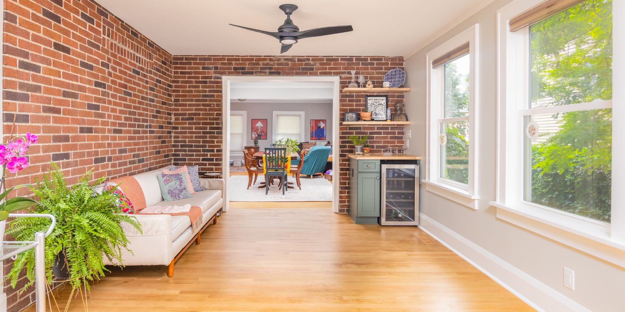 4 Season Room Addition with Brick Wall in Des Moines, Iowa