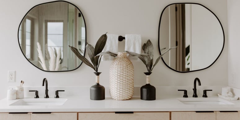 Bathroom Remodel in Des Moines, Iowa with black fixtures and double sink