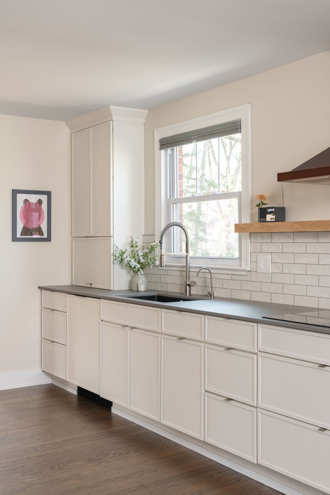 kitchen remodel with white cabinets and gray countertops in des moines iowa