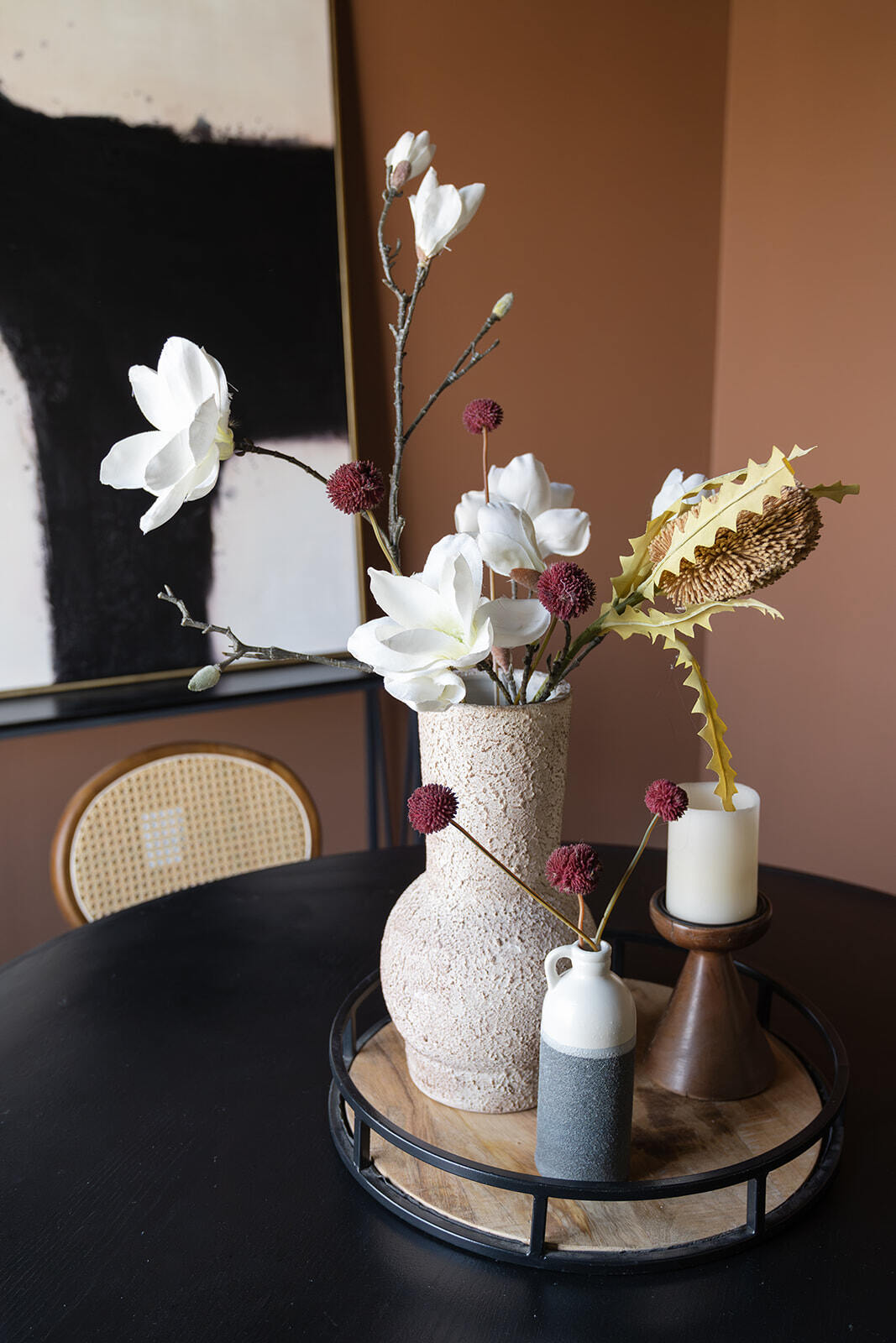 Detail shot of dining room table centerpiece in a rustic modern dining room renovation